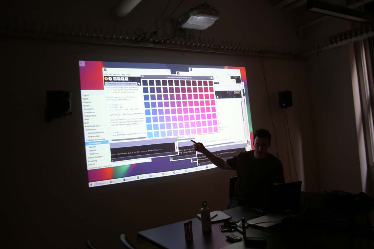 a lecture showing a color palette on screen